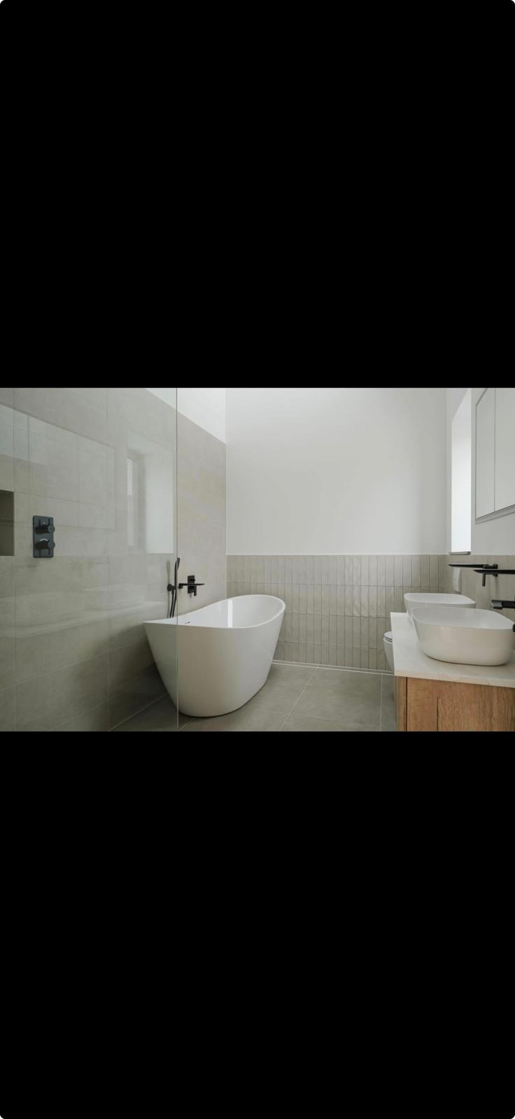 Modern bathroom with freestanding bath